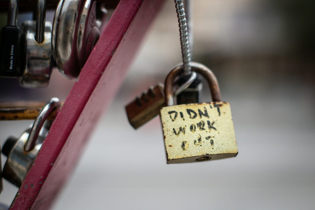 Lock of divorce couple reading "didn't work out"